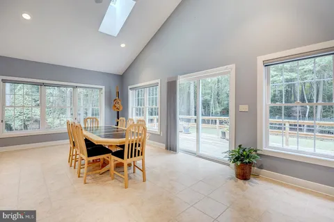 a big room with closet and windows