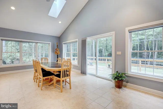 a big room with closet and windows