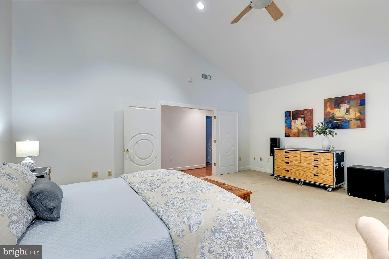 22095 Wilson Road Georgetown, DE 19947 - Photo 42 of 137 a bedroom with a bed and a couch