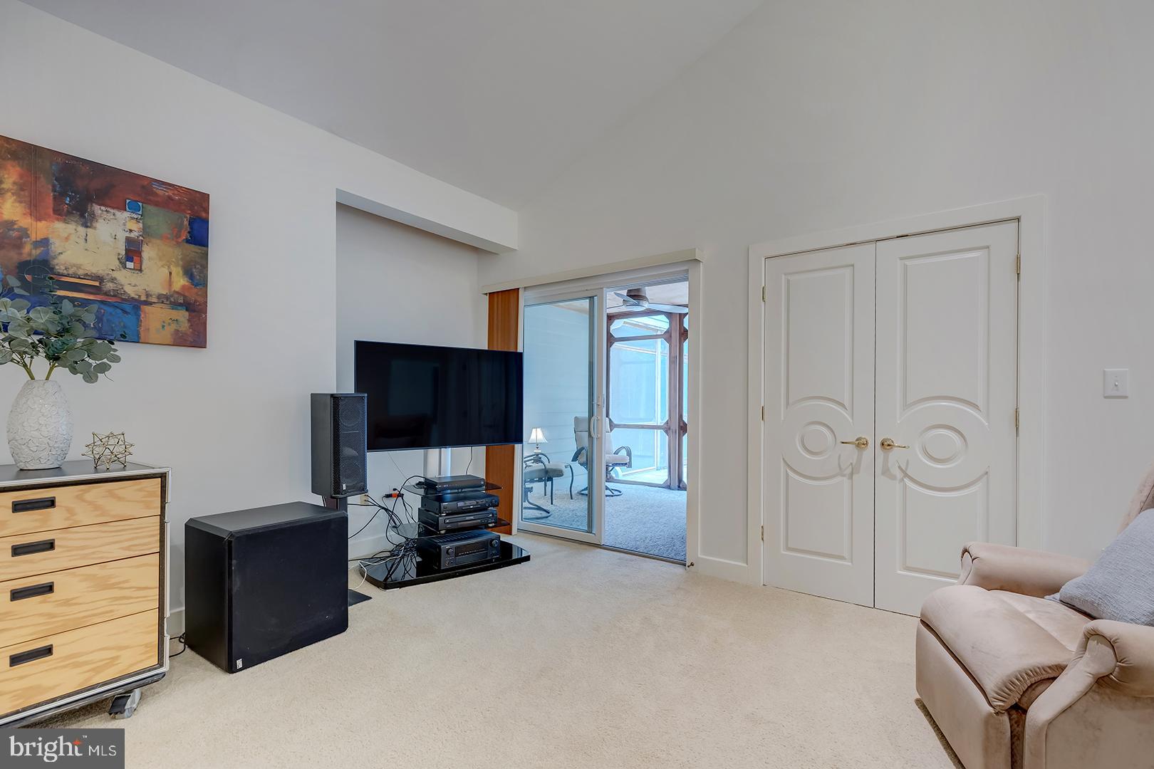 22095 Wilson Road Georgetown, DE 19947 - Photo 50 of 137 a view of a livingroom with furniture and a flat screen tv