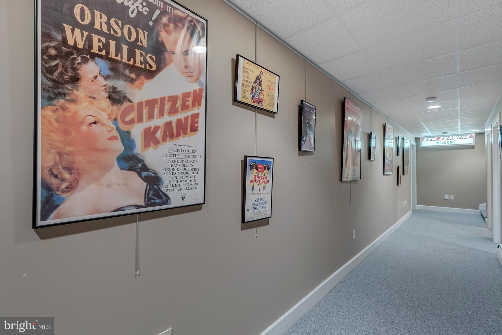 22095 Wilson Road Georgetown, DE 19947 - Photo 70 of 137 a view of a hallway with paintings on the wall