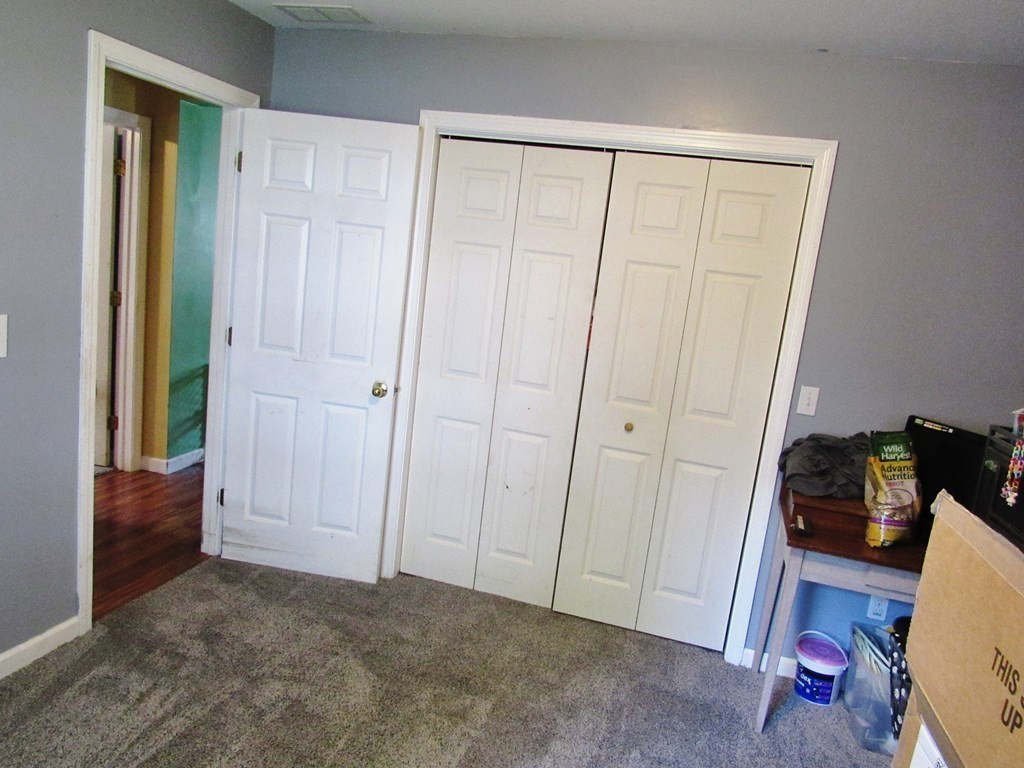 2028 East Street Three Rivers, MA 01080 - Photo 15 of 31 a view of a closet area with hardwood floor