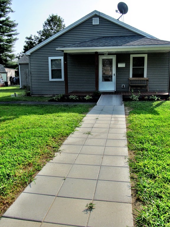 2028 East Street Three Rivers, MA 01080 - Photo 2 of 31 a view of a house with a yard