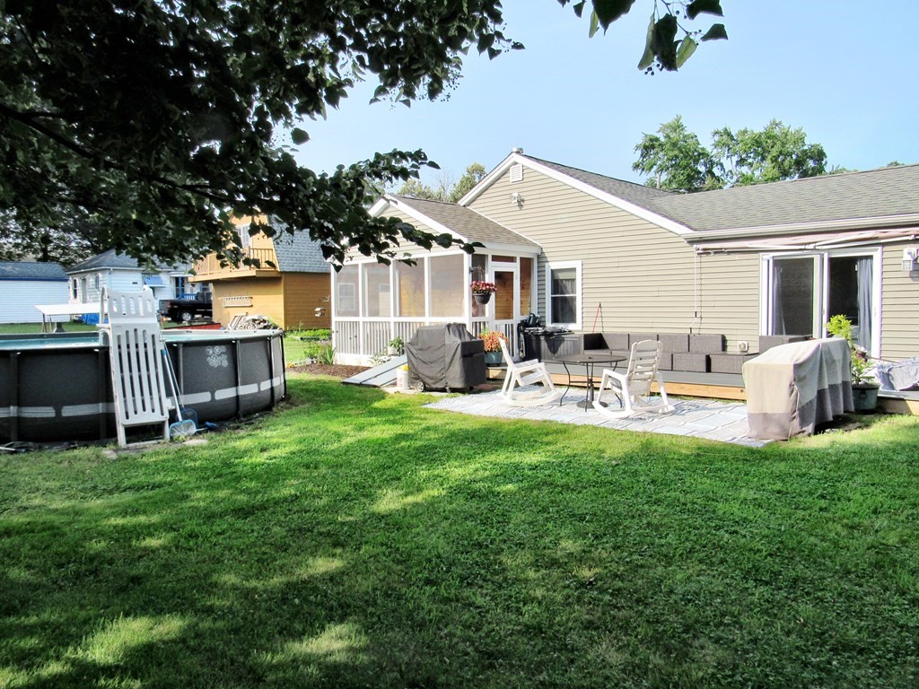 2028 East Street Three Rivers, MA 01080 - Photo 28 of 31 a view of a patio with couches chairs and a fire pit