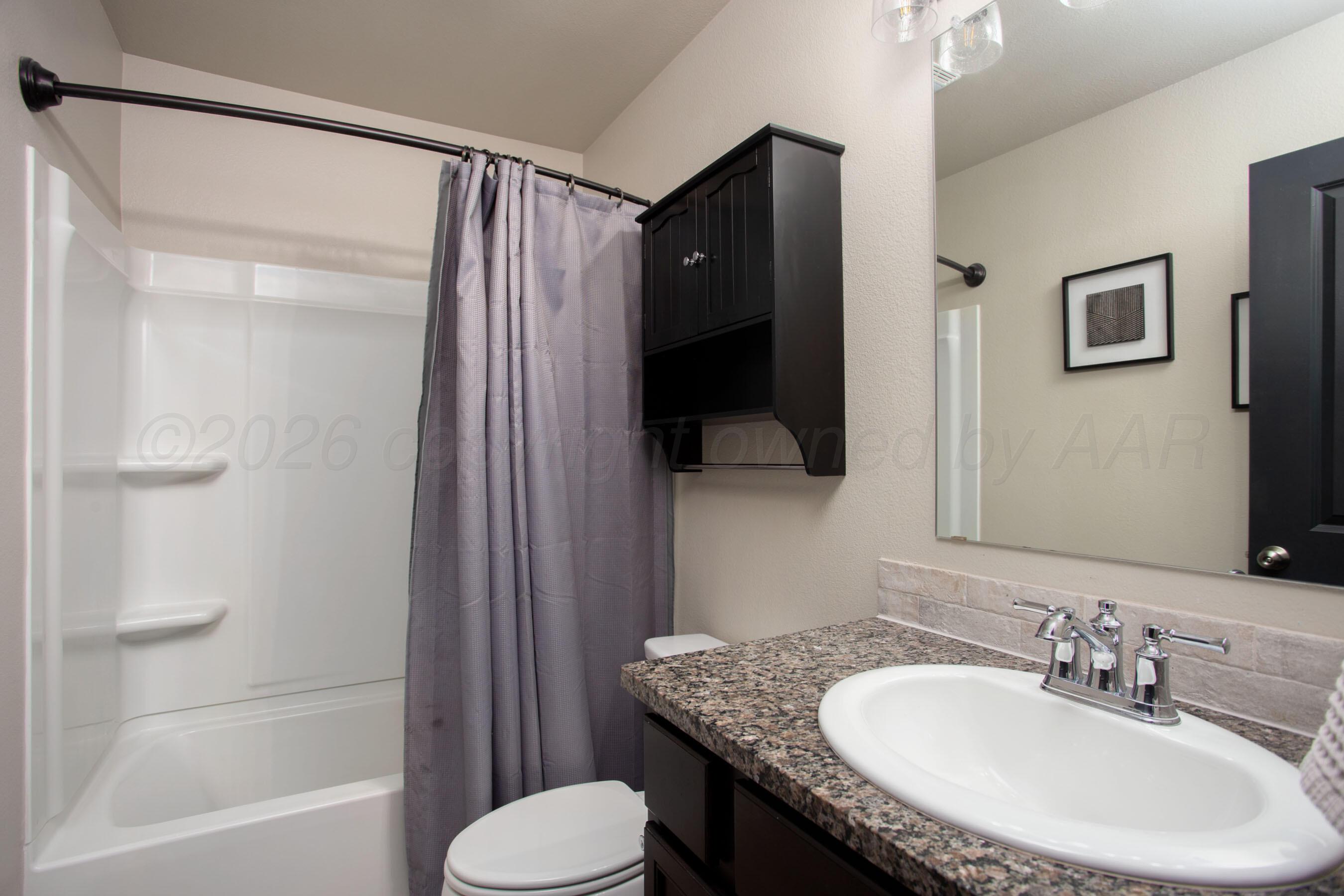 5009 Locker Street Amarillo, TX 79118 - Photo 17 of 21 Primary Bath