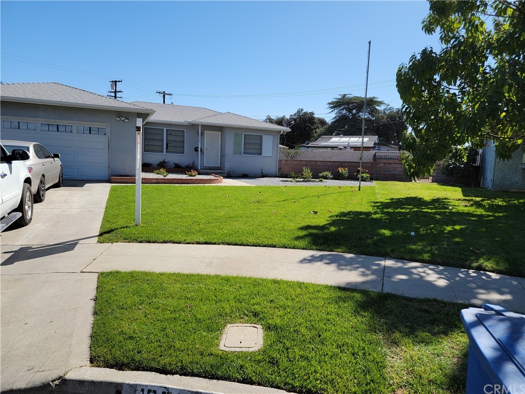 10040 Judy Court Riverside, CA 92503 - Photo 1 of 1 a view of a yard with cars