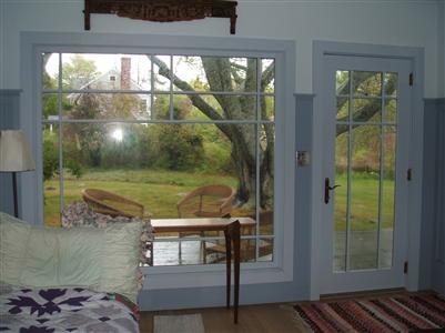 Undisclosed Address Falmouth, MA 02540 - Photo 7 of 13 a view of a balcony door and an outdoor space