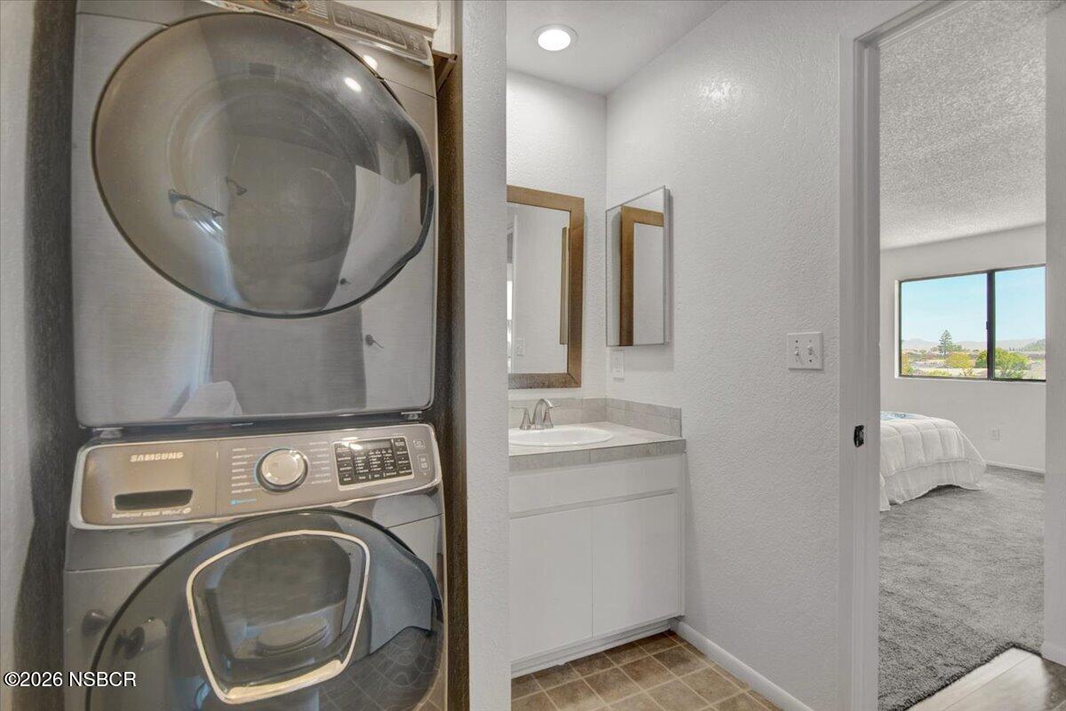 3400 Santa Maria Way, Unit 207B Santa Maria, CA 93455 - Photo 34 of 50 a view of a storage and utility room with washer and dryer