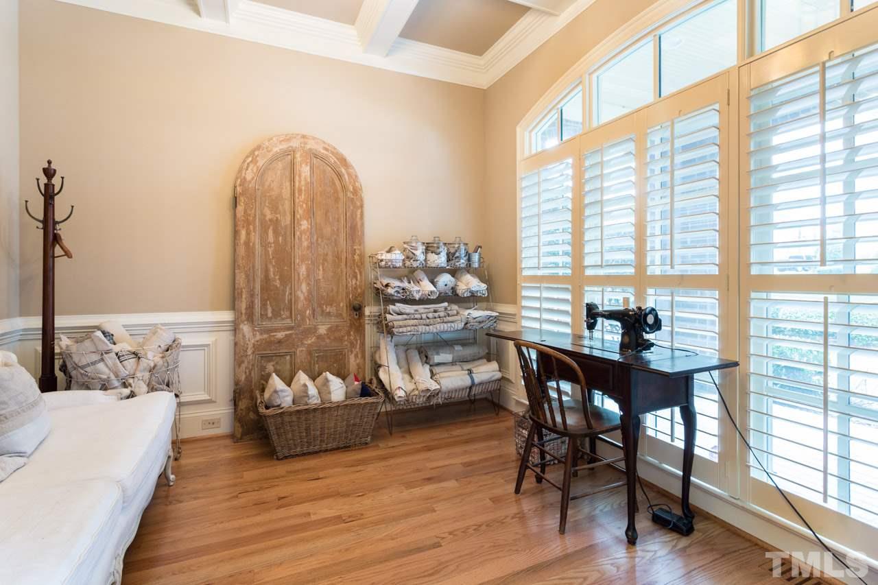 3215 Rain Forrest Way Raleigh, NC 27614 - Photo 11 of 30 Coffered Ceiling, Wainscoting, Plantation Shutters, and Hardwood Floors