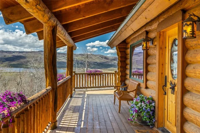 a view of a balcony with wooden floor
