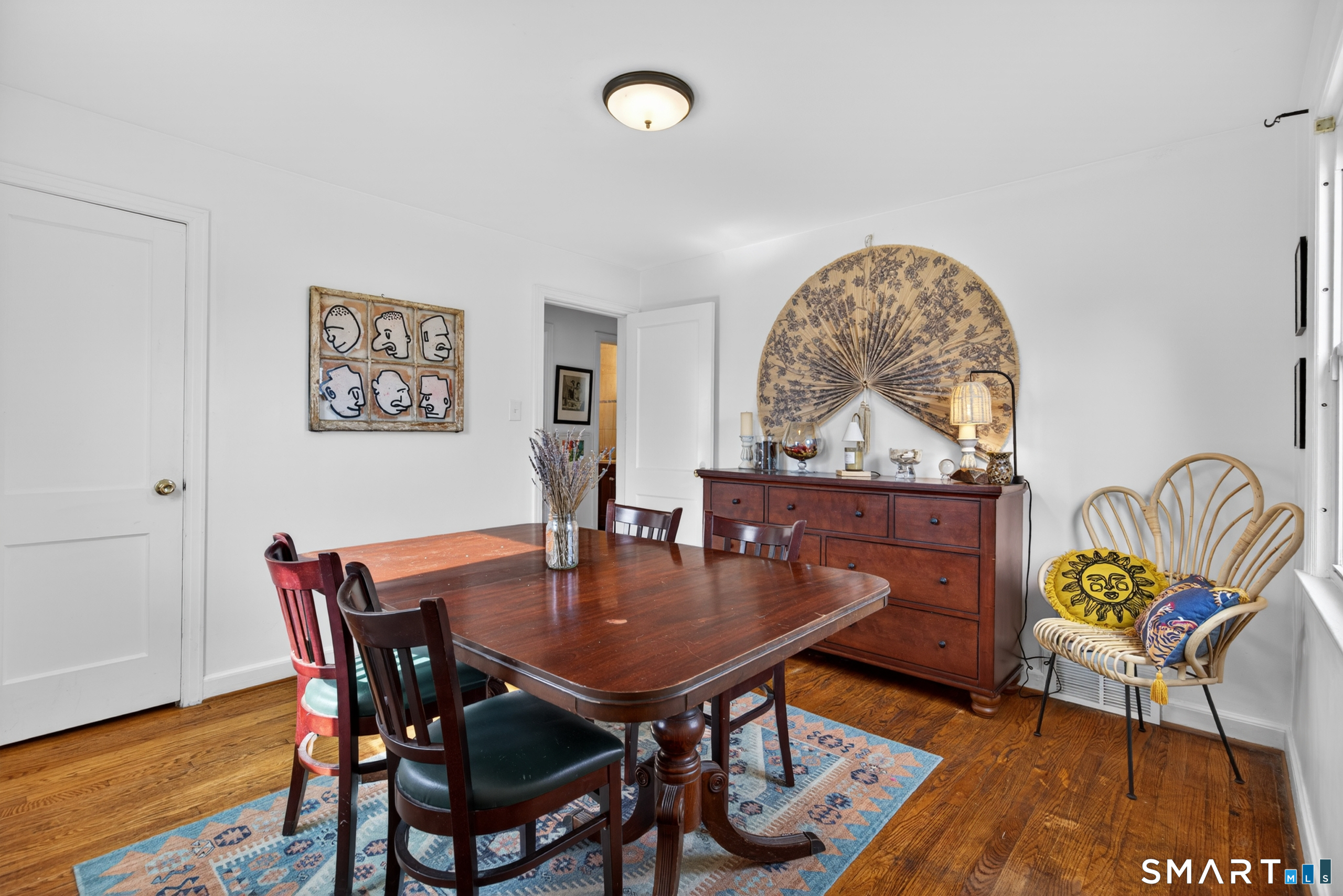 6 Welch Street Hamden, CT 06514 - Photo 13 of 23 a view of a dining room with furniture and wooden floor