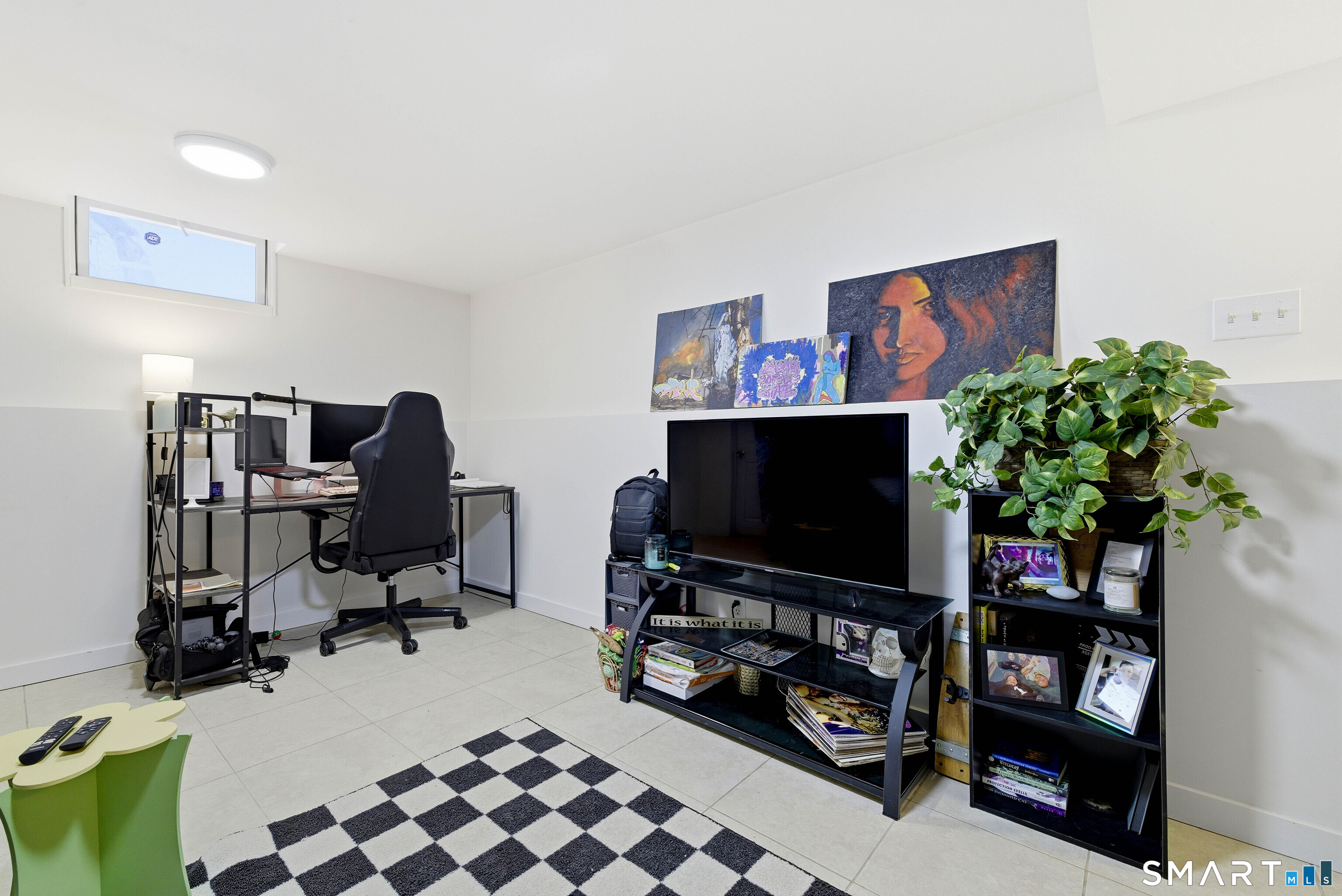 6 Welch Street Hamden, CT 06514 - Photo 19 of 23 a room with furniture and a flat screen tv