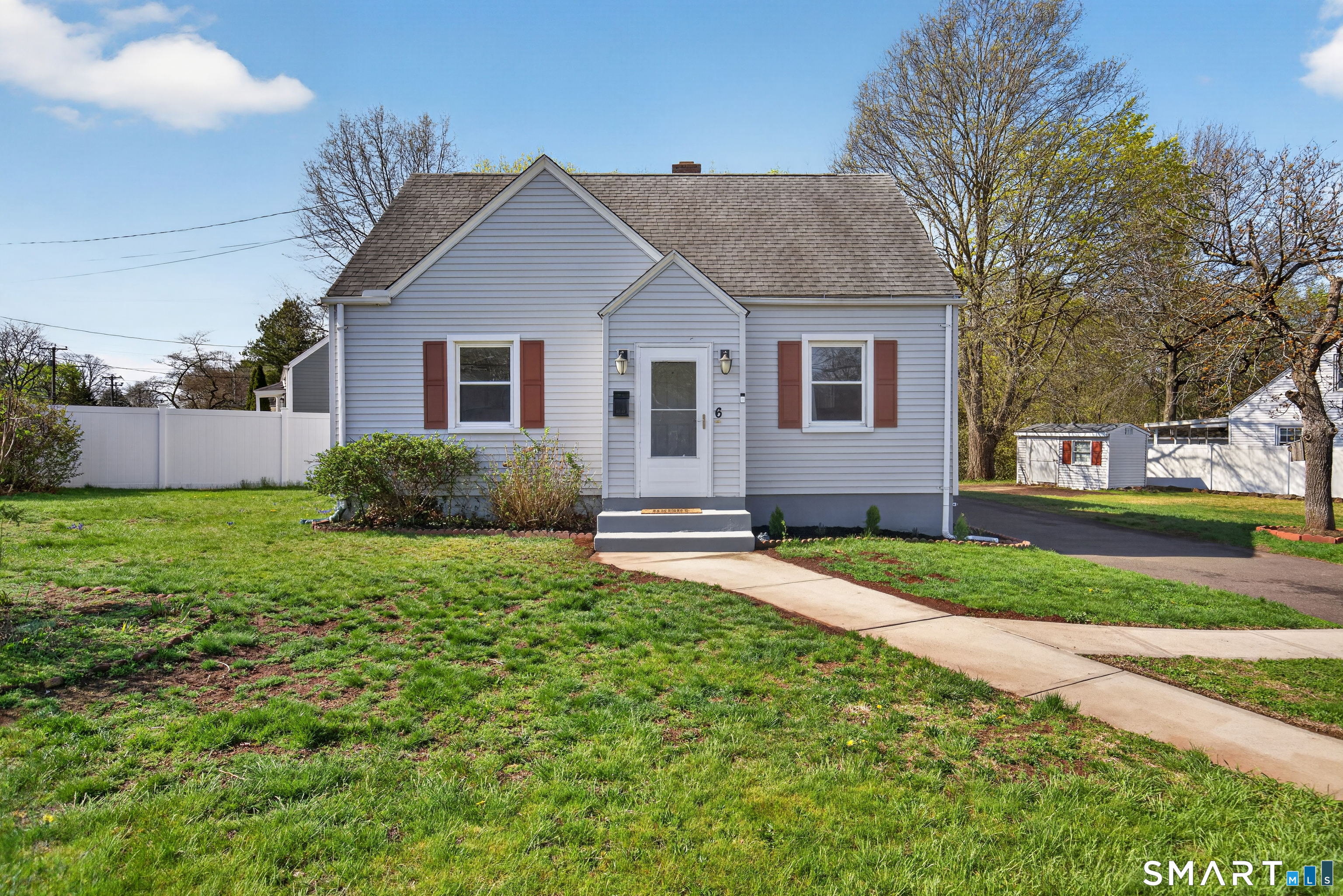 6 Welch Street Hamden, CT 06514 - Photo 23 of 23 a view of front of house with a yard