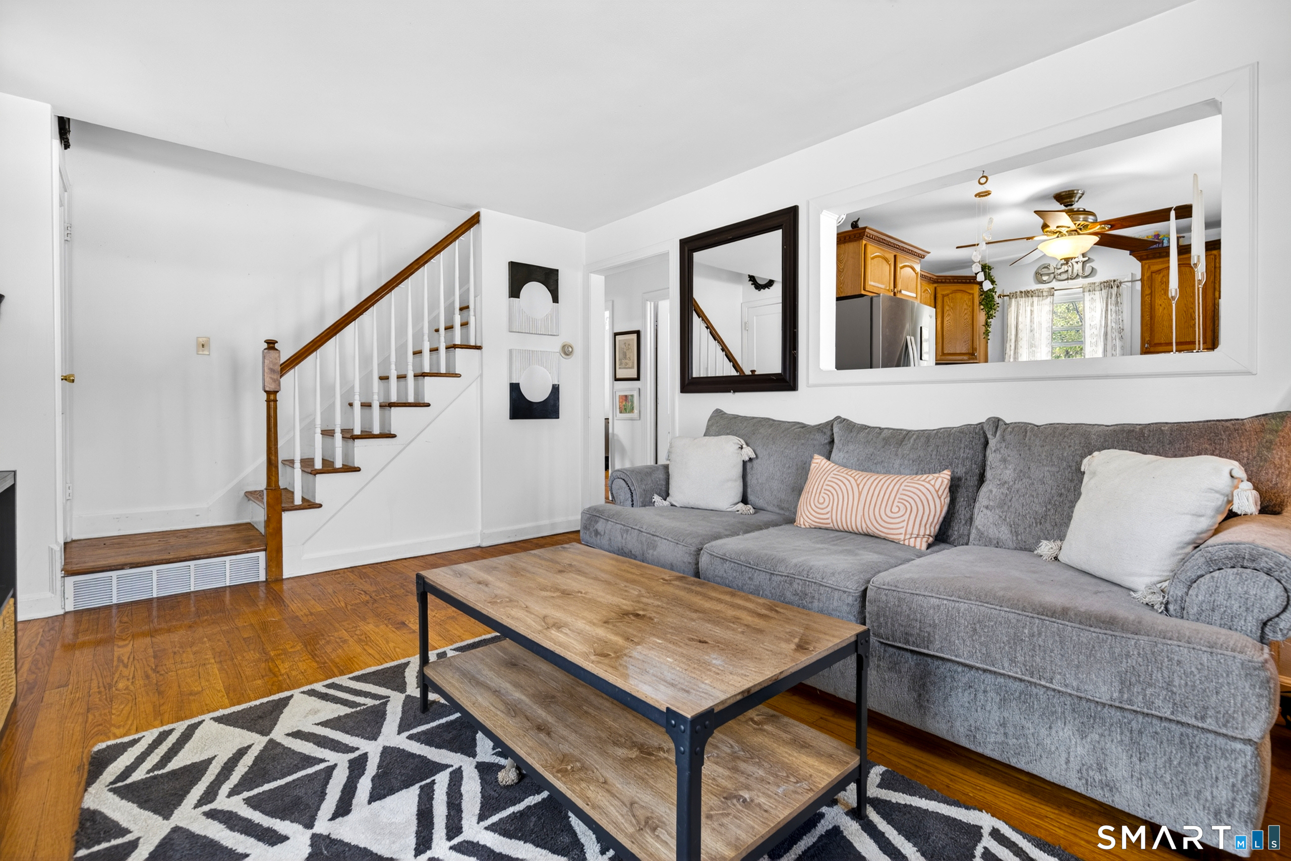 6 Welch Street Hamden, CT 06514 - Photo 3 of 23 a living room with furniture and a wooden floor