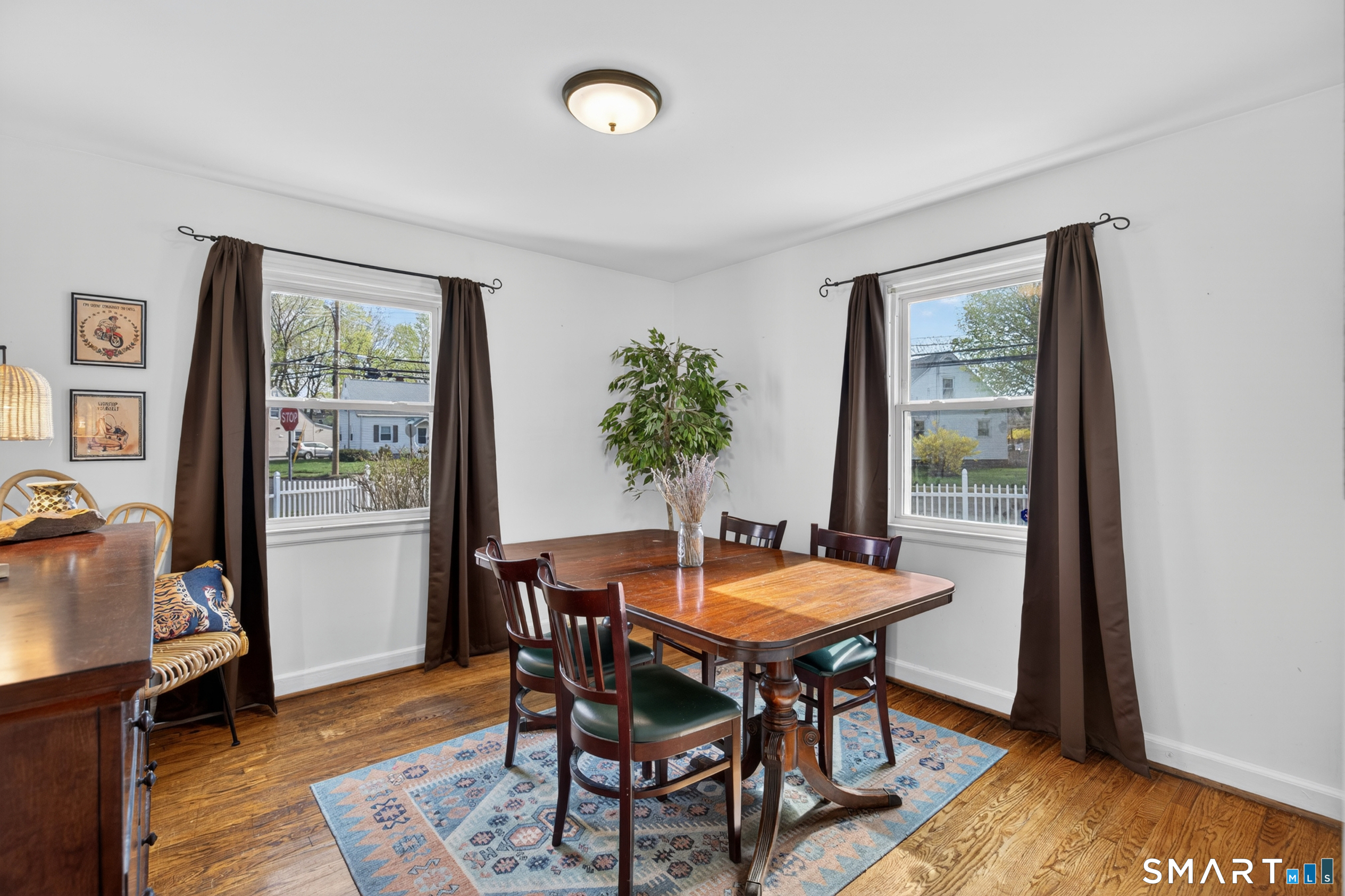 6 Welch Street Hamden, CT 06514 - Photo 5 of 23 a view of a dining room with furniture and window