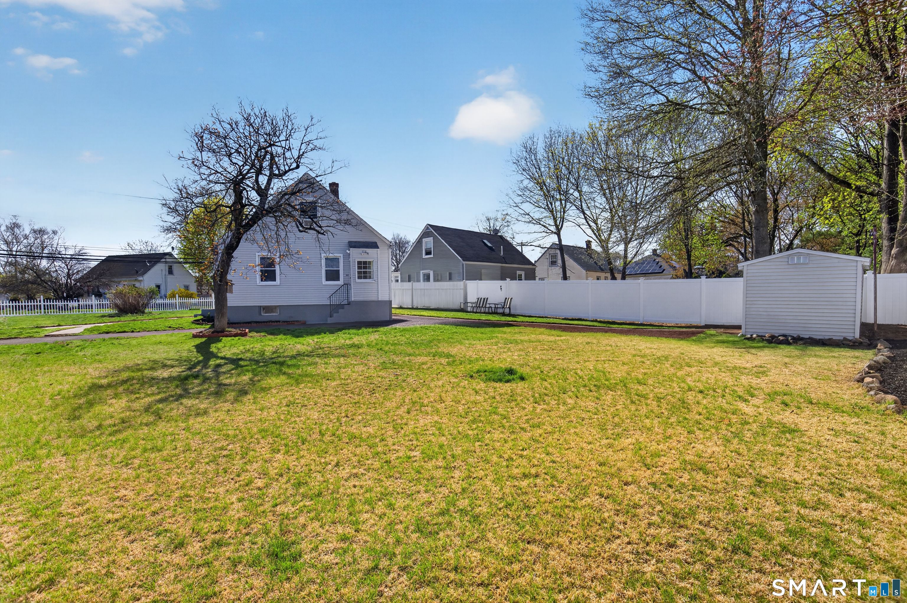 6 Welch Street Hamden, CT 06514 - Photo 8 of 23 a house view with a garden space