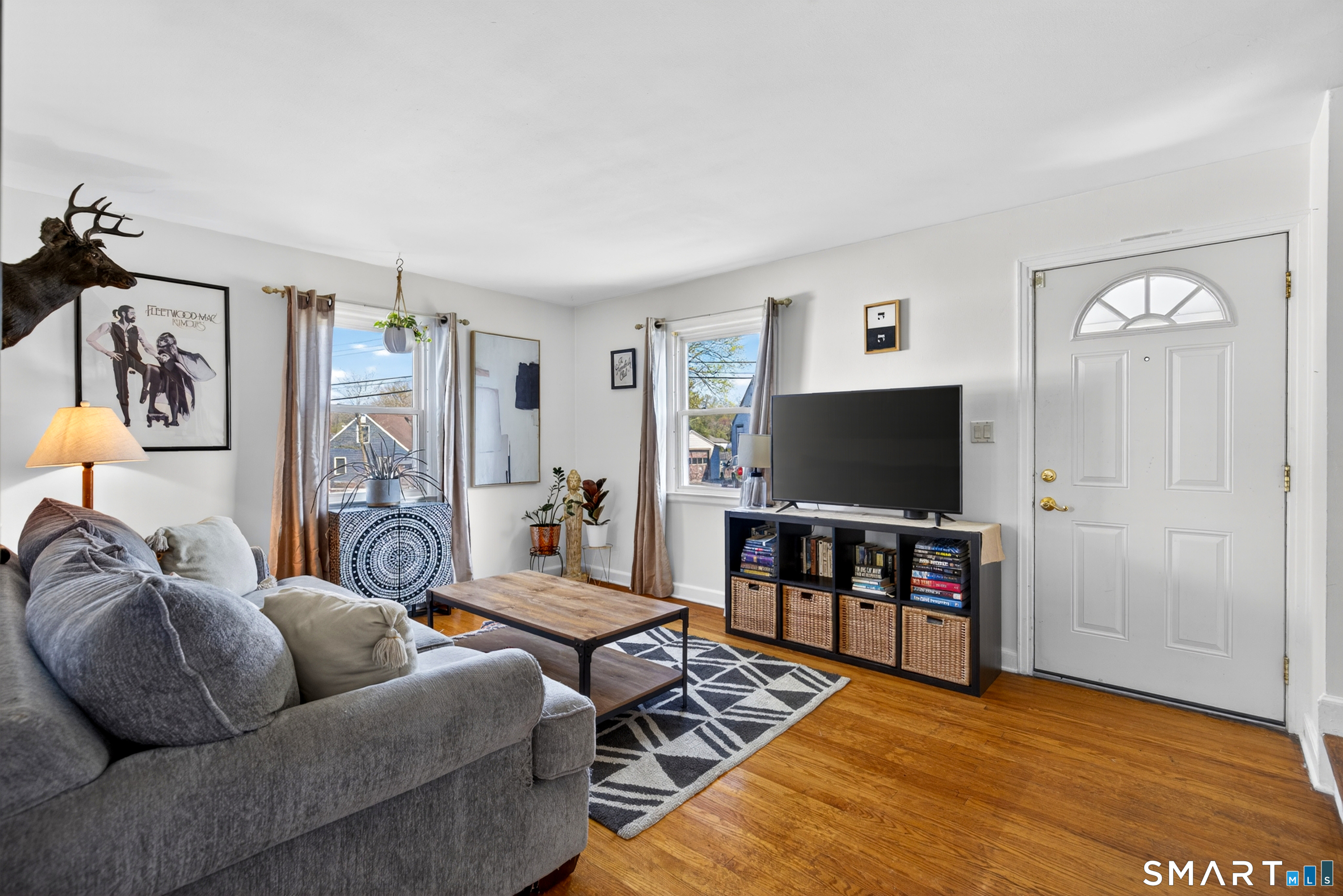 6 Welch Street Hamden, CT 06514 - Photo 10 of 23 a living room with furniture and a flat screen tv