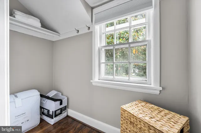 a room with furniture and a window