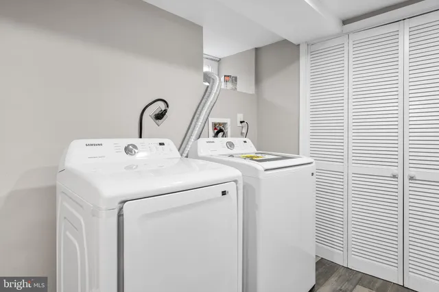 a utility room with dryer and washer