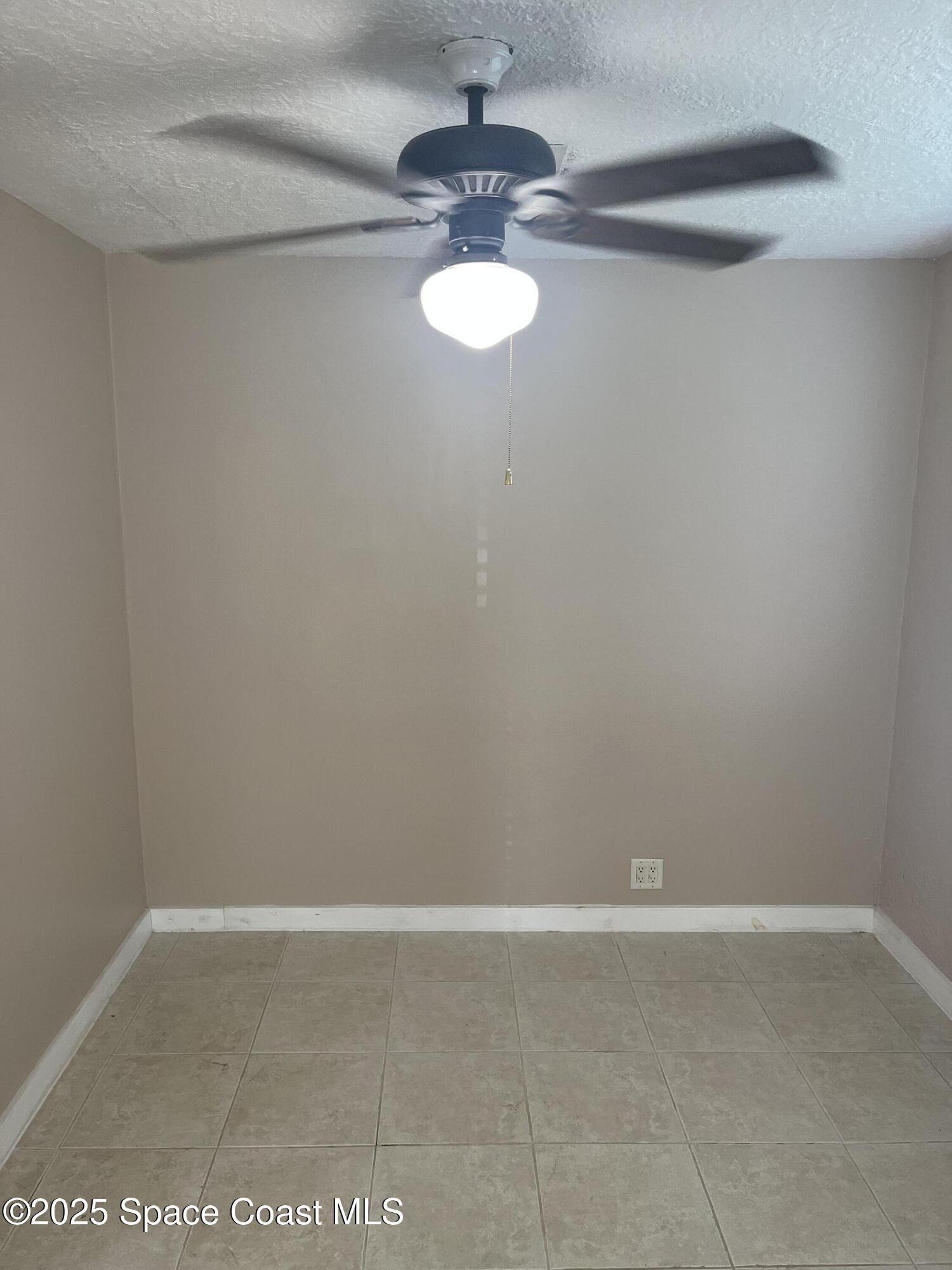 510 East Strawbridge Avenue, Unit BSALON Melbourne, FL 32901 - Photo 7 of 11 a view of empty room