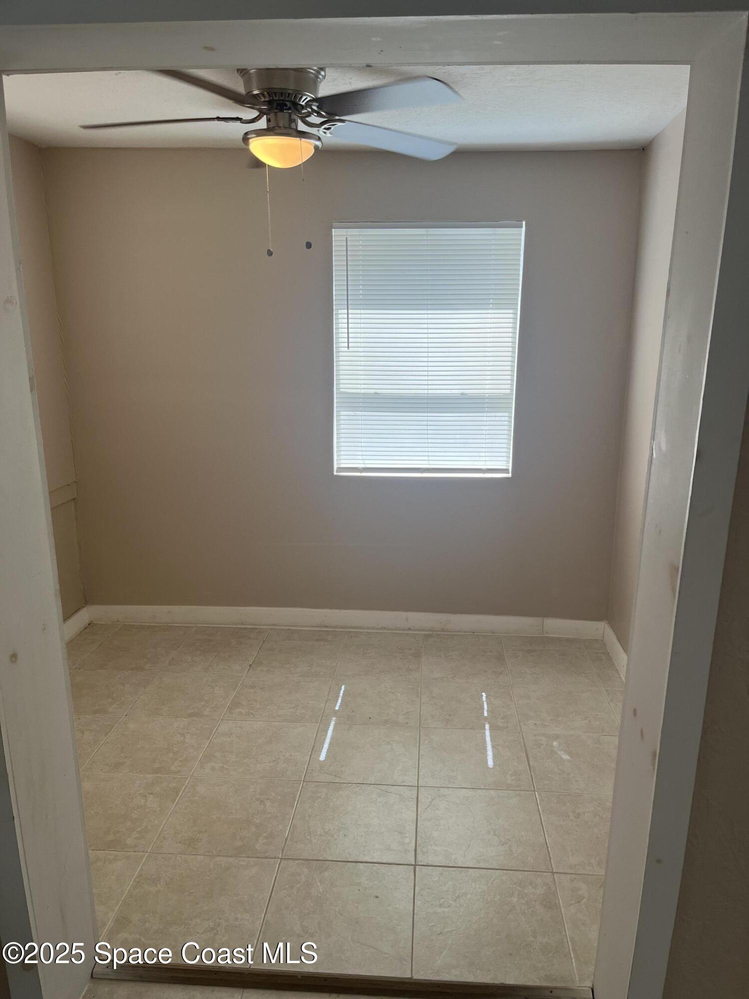 510 East Strawbridge Avenue, Unit BSALON Melbourne, FL 32901 - Photo 8 of 11 a view of an empty room
