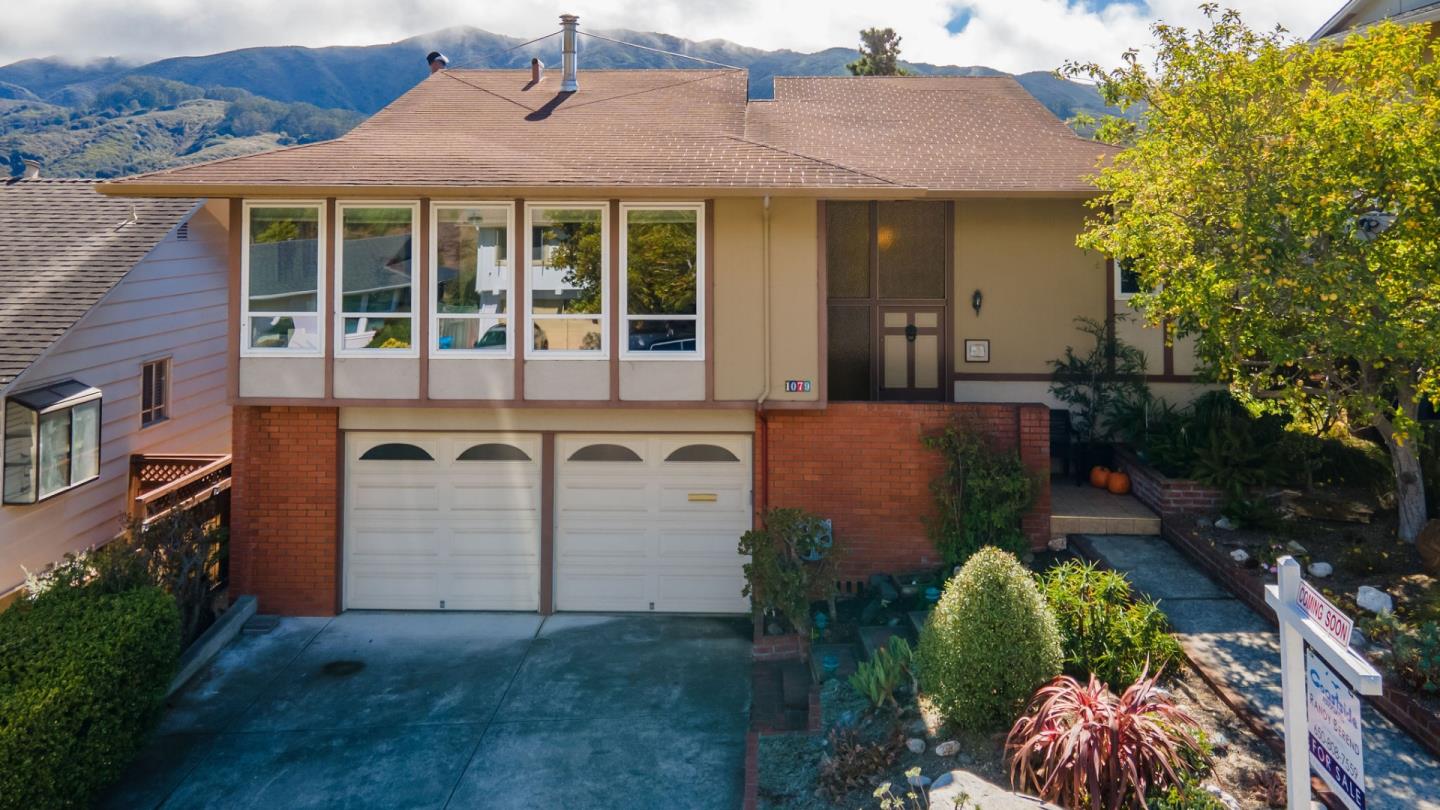 1079 Park Pacifica Avenue Pacifica, CA 94044 - Photo 3 of 43 front view of a house with a yard