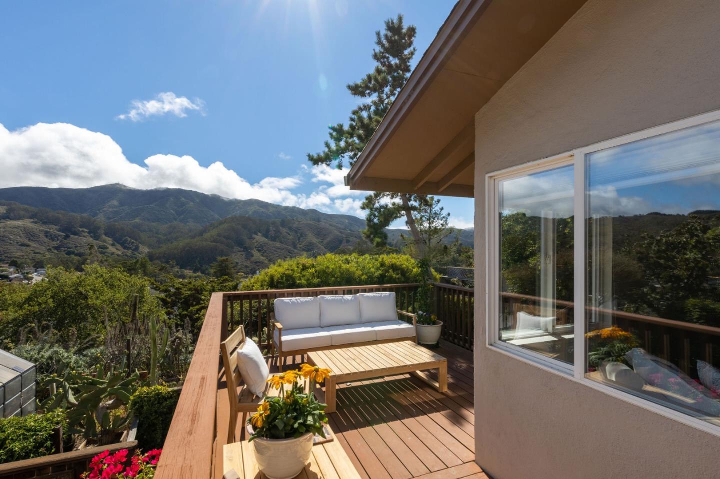 1079 Park Pacifica Avenue Pacifica, CA 94044 - Photo 28 of 43 a view of balcony with two chairs and wooden floor