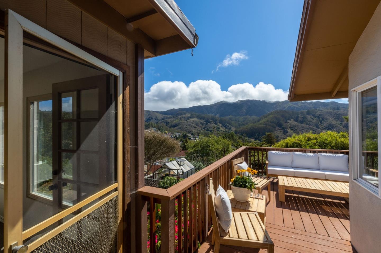 1079 Park Pacifica Avenue Pacifica, CA 94044 - Photo 29 of 43 a view of a balcony with furniture and wooden floor