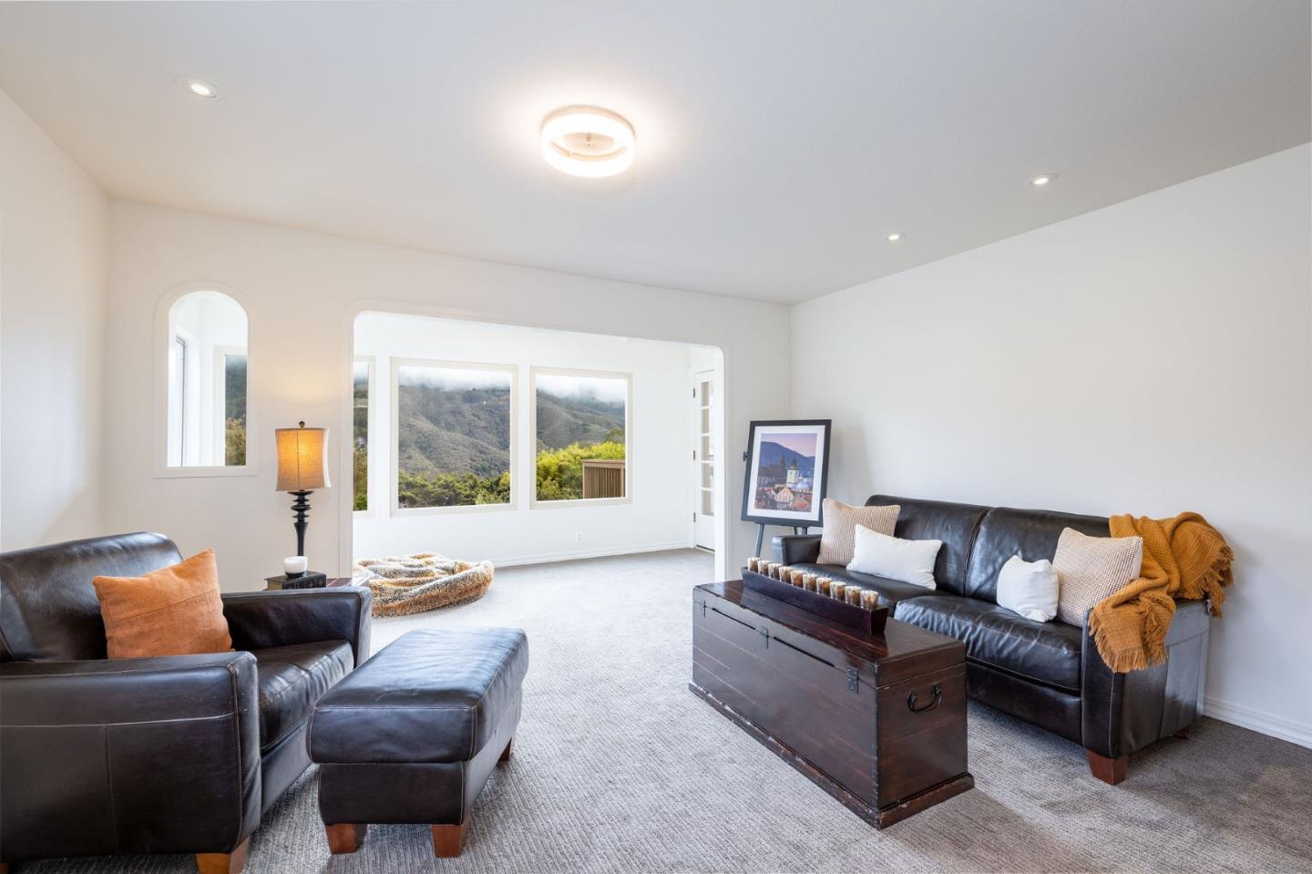 1079 Park Pacifica Avenue Pacifica, CA 94044 - Photo 10 of 43 a living room with furniture and a large window