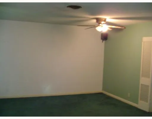 a view of a room with a fan