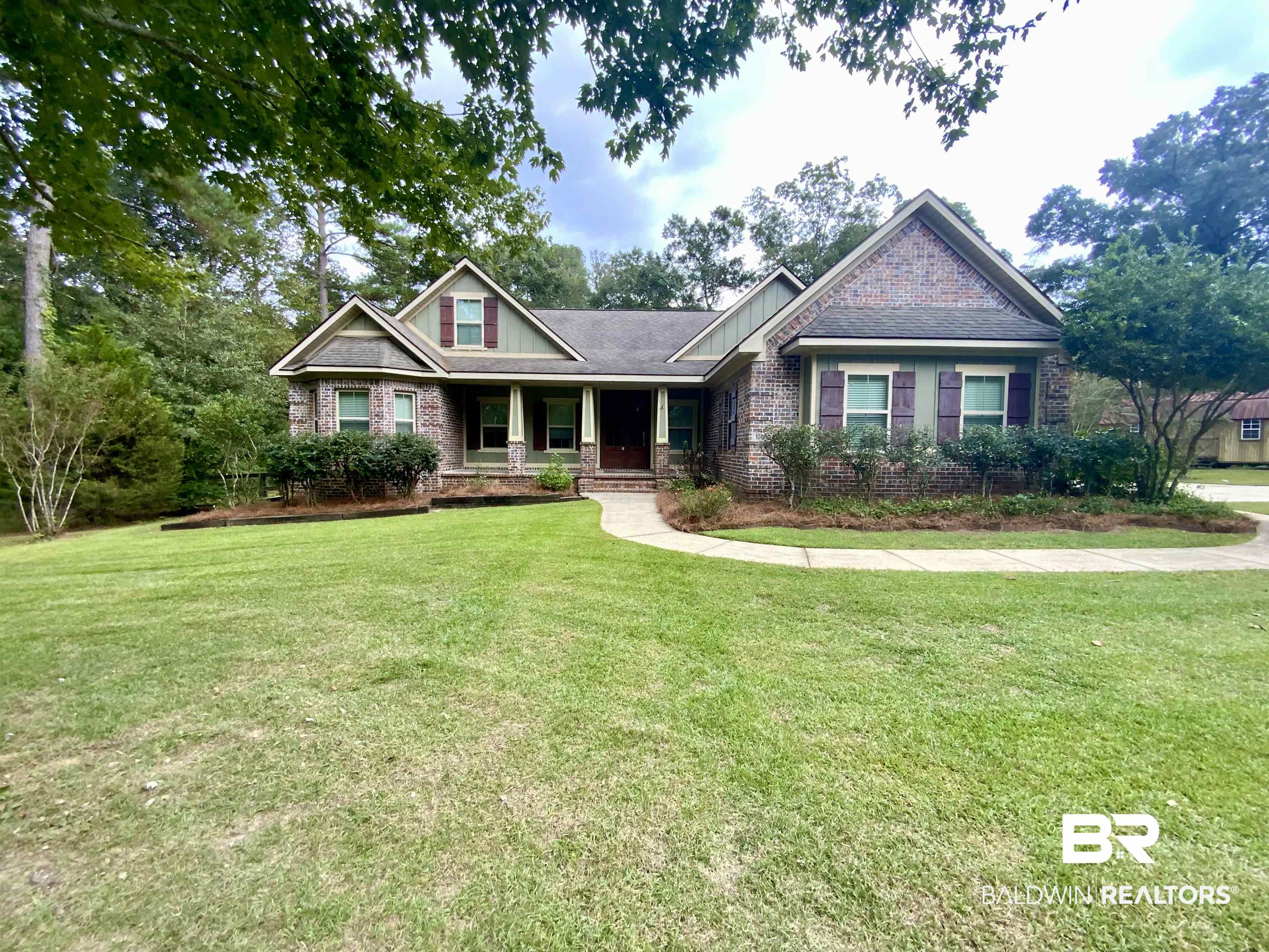10846 County Road 138 Bay Minette, AL 36507 - Photo 1 of 53 Craftsman inspired home featuring a front lawn and a porch
