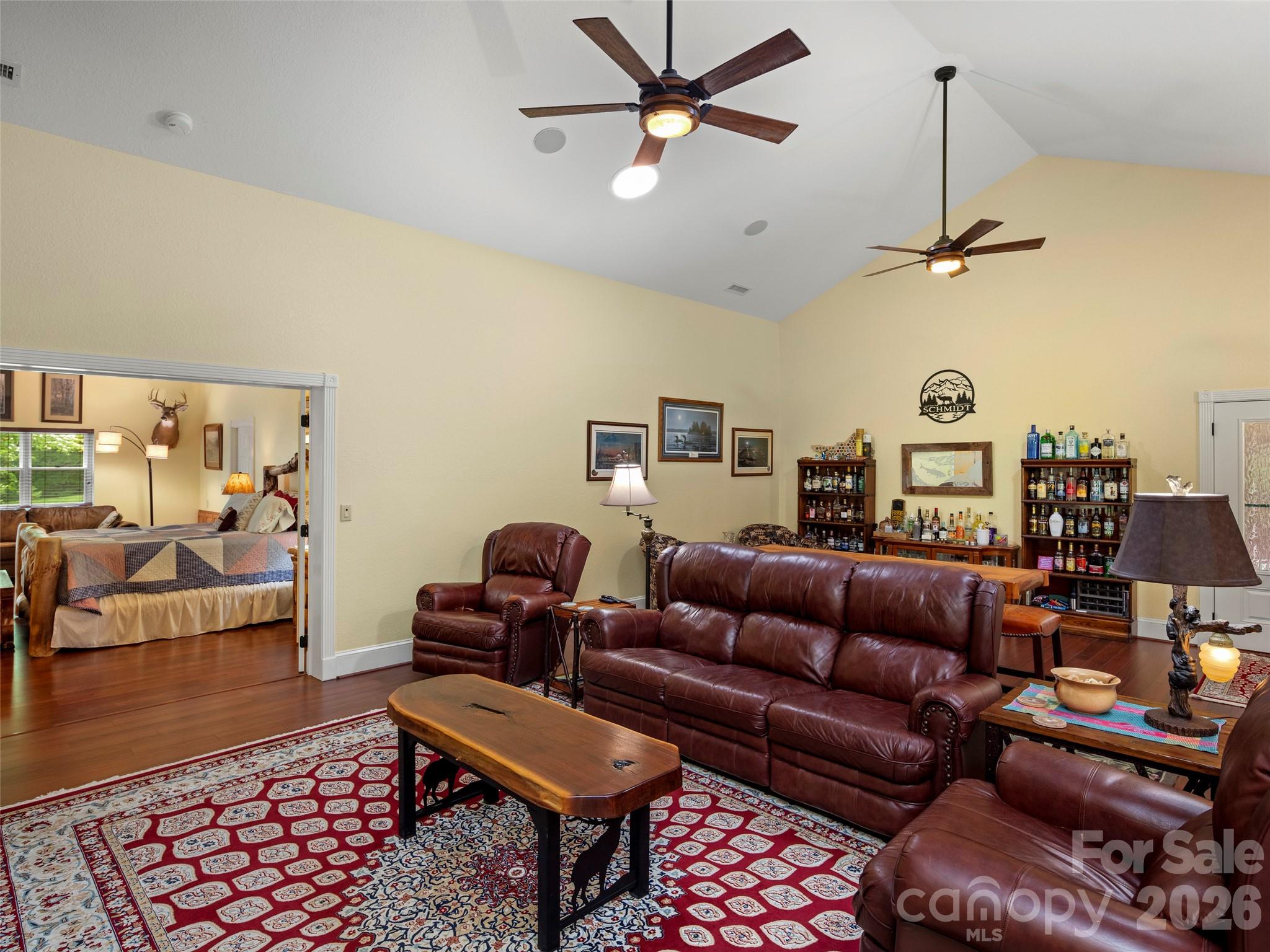 79 Ward Road Maggie Valley, NC 28751 - Photo 13 of 48 a living room with furniture a ceiling fan and a rug
