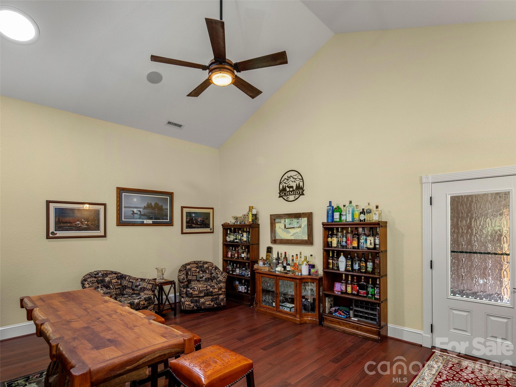 79 Ward Road Maggie Valley, NC 28751 - Photo 22 of 48 a living room with furniture and a bookshelf