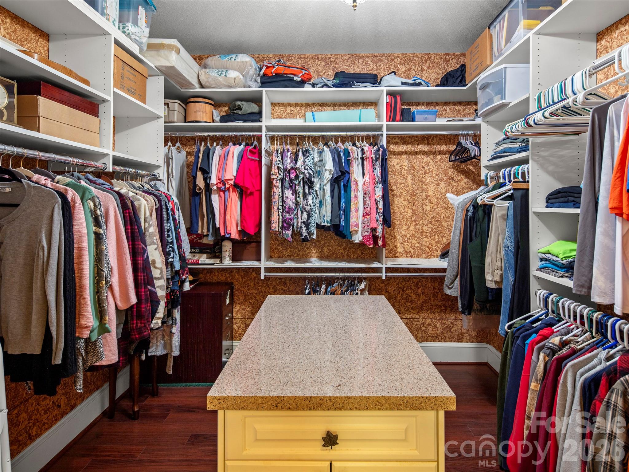 79 Ward Road Maggie Valley, NC 28751 - Photo 32 of 48 a view of walk in closet with clothes and shoes