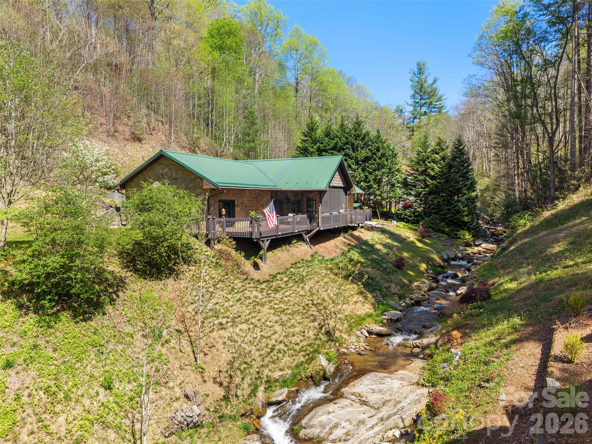 79 Ward Road Maggie Valley, NC 28751 - Photo 38 of 48 a view of a house with a yard