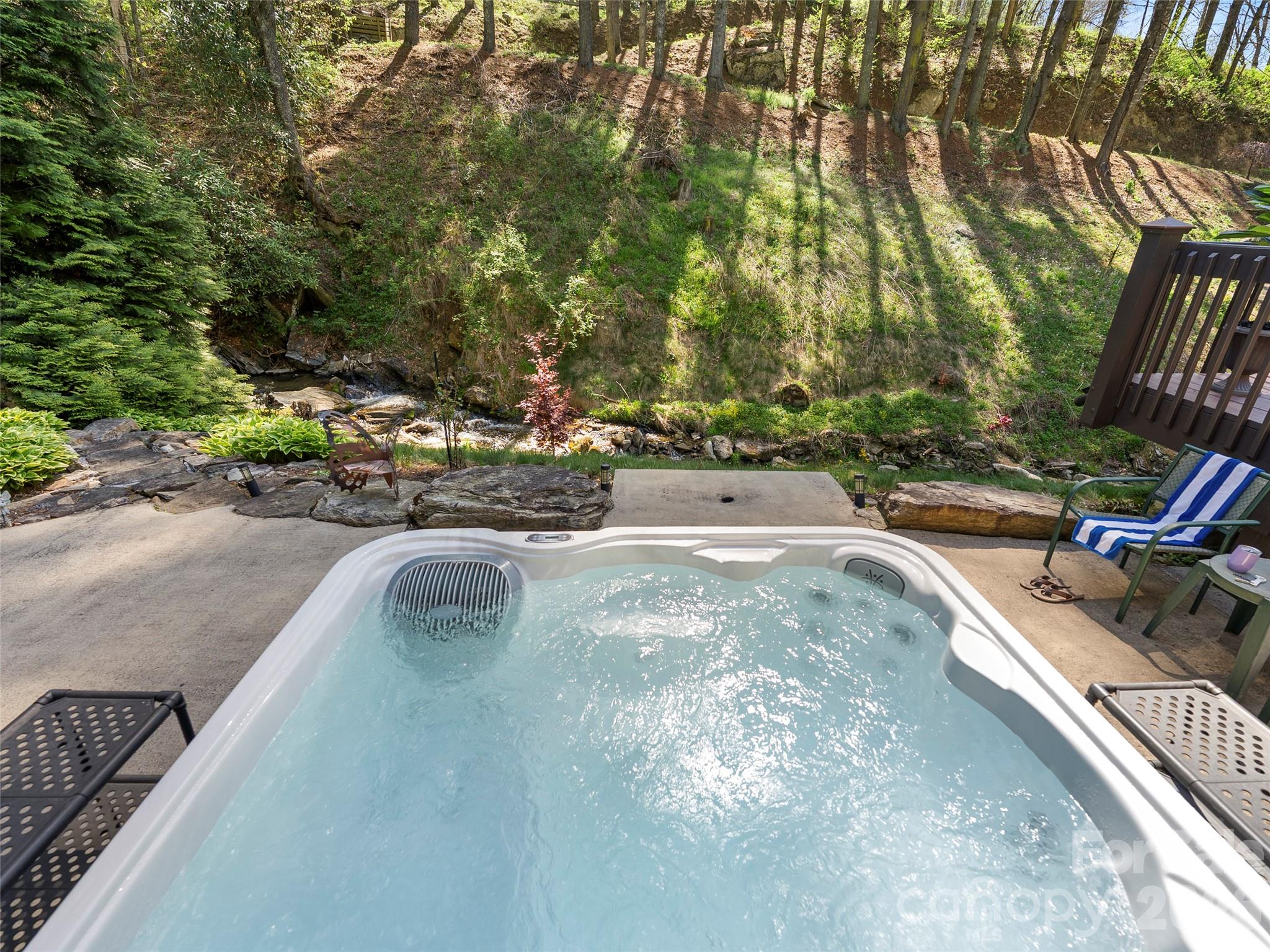79 Ward Road Maggie Valley, NC 28751 - Photo 39 of 48 a view of a swimming pool with a yard