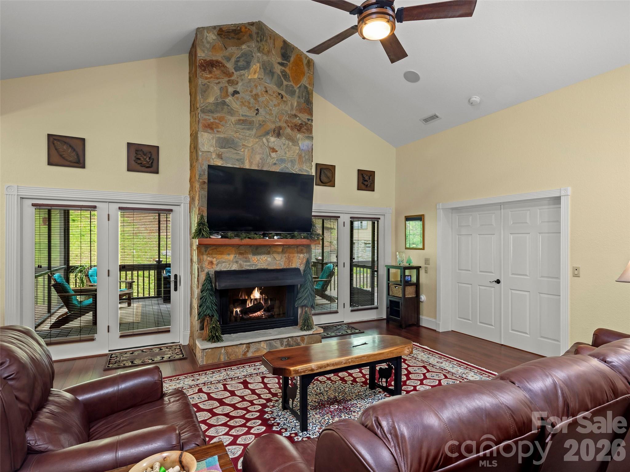 79 Ward Road Maggie Valley, NC 28751 - Photo 10 of 48 a living room with furniture and a fireplace