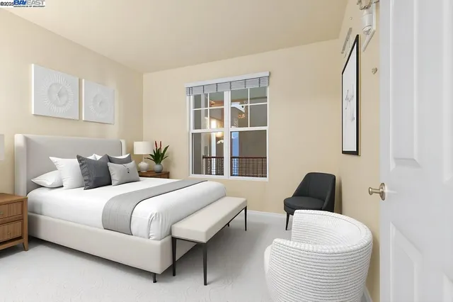 a bedroom with bed and a window