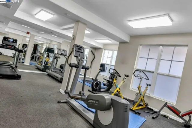 a view of a livingroom with furniture and a flat screen tv