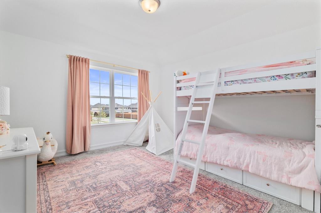 4001 Maida Road McKinney, TX 75071 - Photo 29 of 36 a bedroom with a bed and a window