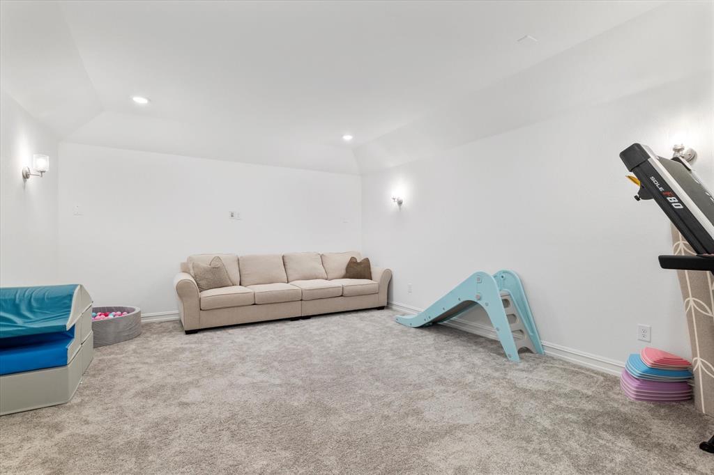 4001 Maida Road McKinney, TX 75071 - Photo 32 of 36 a living room with furniture