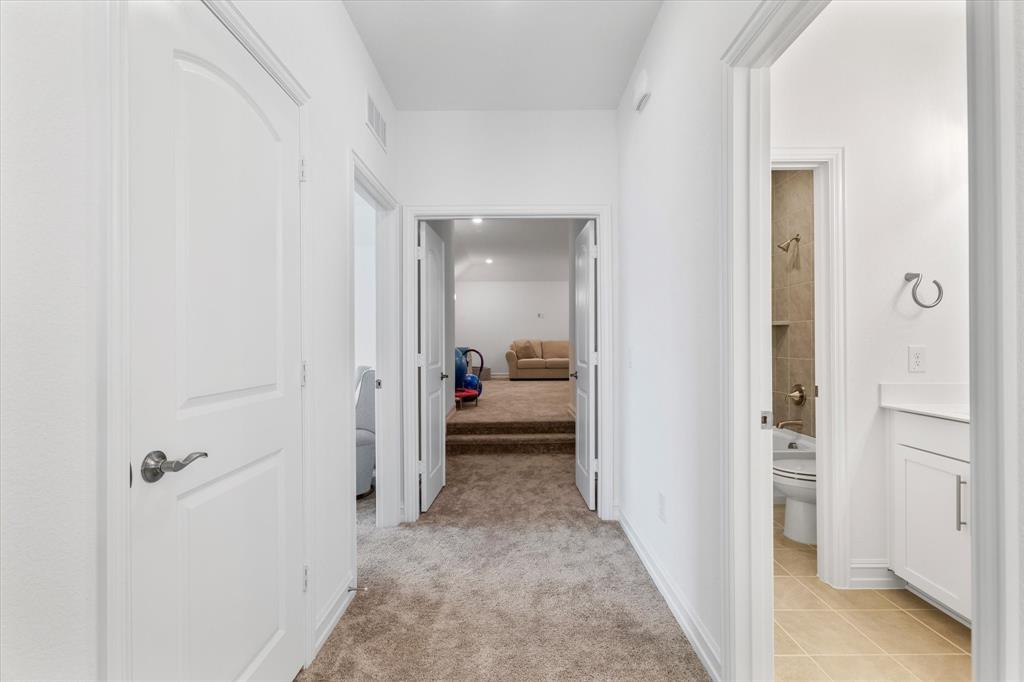4001 Maida Road McKinney, TX 75071 - Photo 33 of 36 a view of a bedroom from a hallway