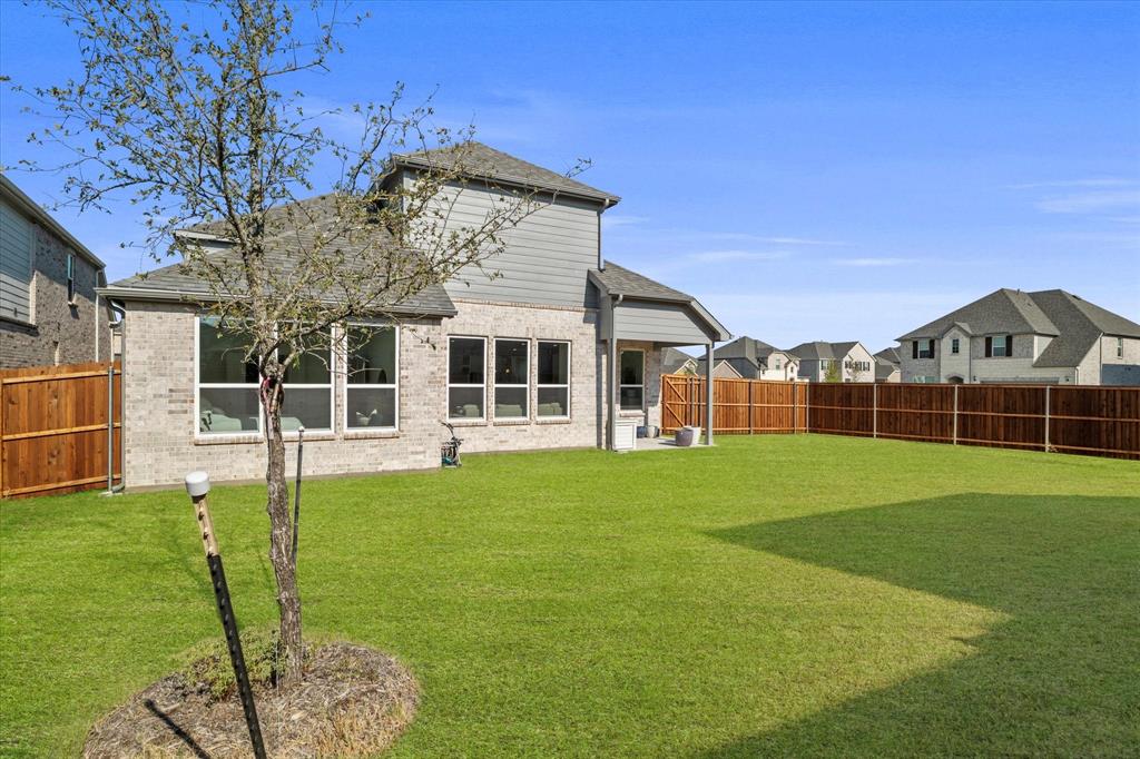 4001 Maida Road McKinney, TX 75071 - Photo 36 of 36 a view of a house with a backyard