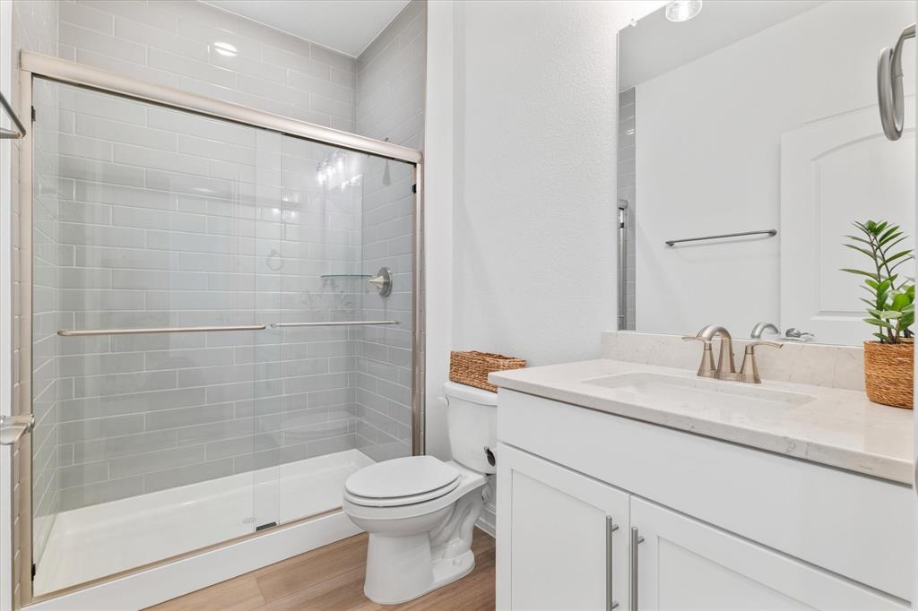 4001 Maida Road McKinney, TX 75071 - Photo 8 of 36 a bathroom with a sink toilet and shower
