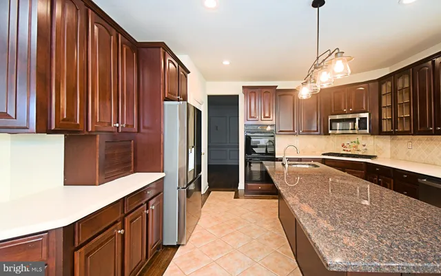 a view of a livingroom with an empty space and a fireplace