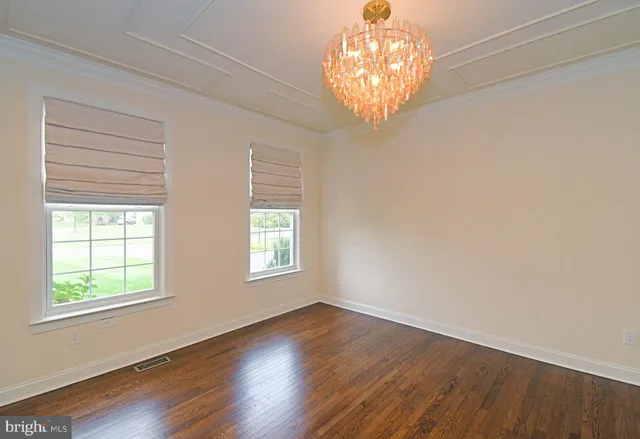 a kitchen with stainless steel appliances granite countertop a sink a stove and a center island