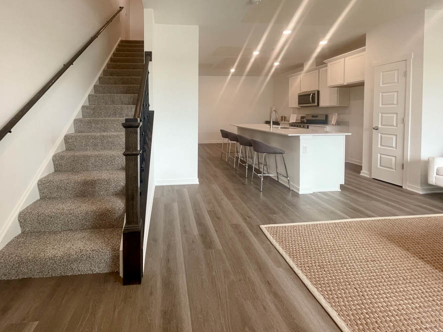 2116 Bodega Drive Oswego, IL 60543 - Photo 15 of 36 a view of kitchen with sink and wooden floor
