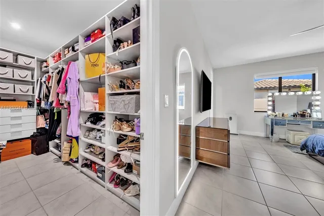 a view of room with toys and flat screen tv