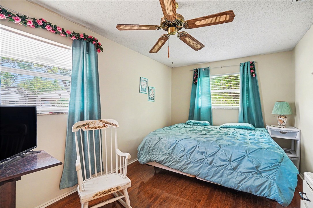 748 Cranbrook Avenue Northeast Palm Bay, FL 32905 - Photo 19 of 26 a bedroom with a bed and a window