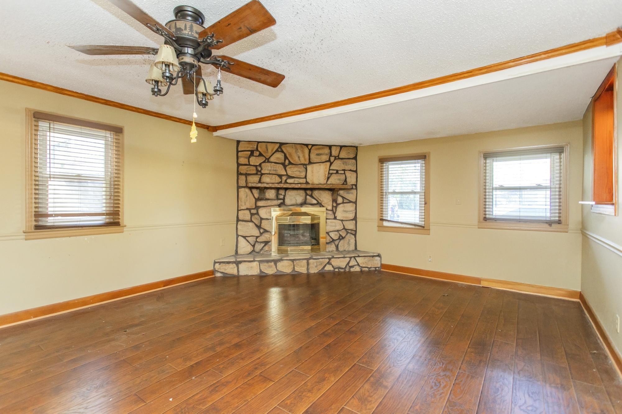 1700 Riverside Road Old Hickory, TN 37138 - Photo 13 of 59 a view of an empty room with a window and wooden floor